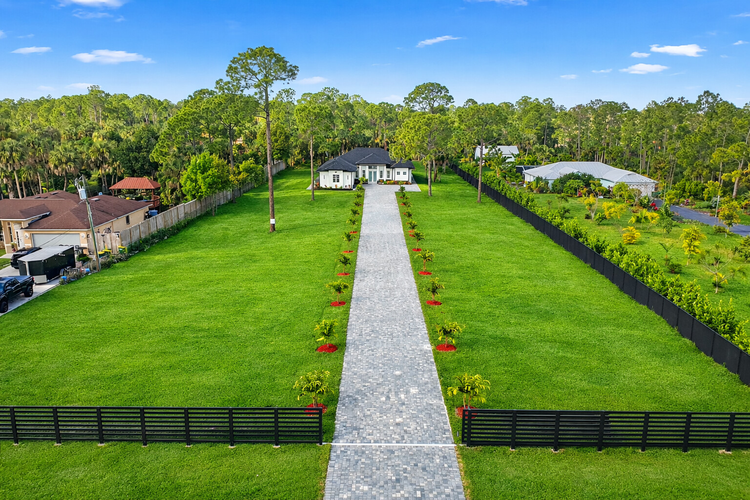Aerial View of 1687 19th St SW featuring a gated and fully fenced property. Huge Acreage