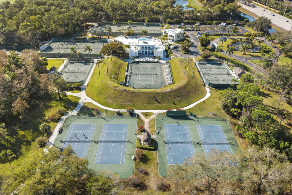 Drone view of World Tennis Center in Naples Florida showcasing community lifestyle for buyers moving to Naples Florida