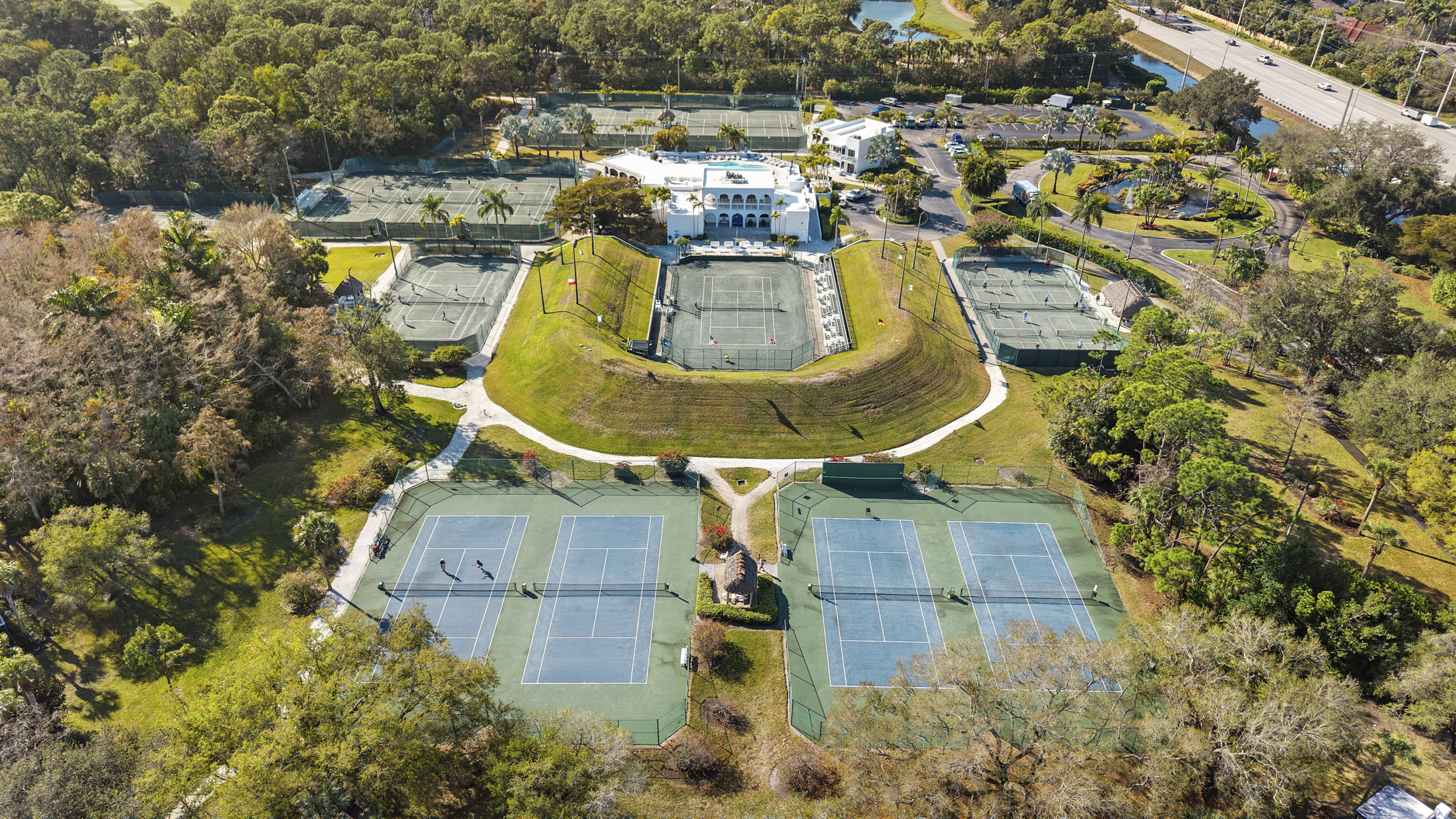 Drone view of World Tennis Center in Naples Florida showcasing community lifestyle for buyers moving to Naples Florida