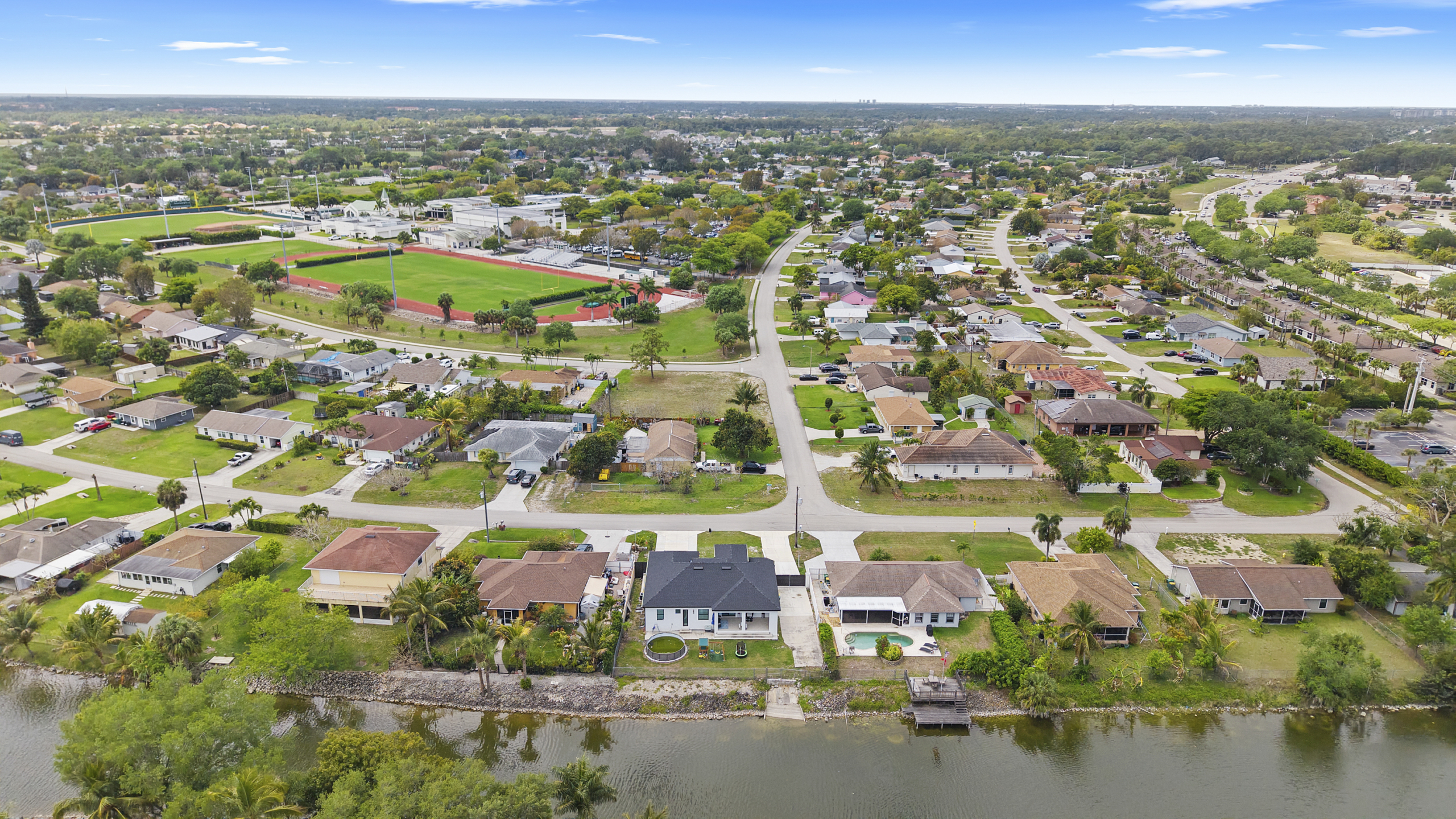 Sweeping aerial view over Golden Gate Estates and Naples, Florida neighborhoods