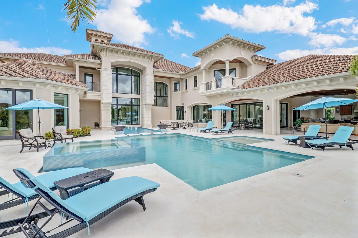 Resort-style pool and covered lanai at a luxury home in Naples, Florida