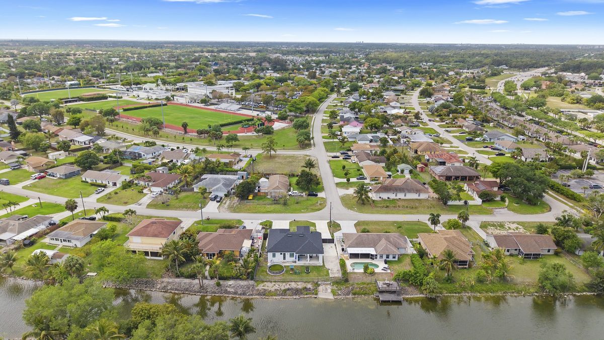 Sweeping aerial view over Golden Gate Estates and Naples, Florida neighborhoods