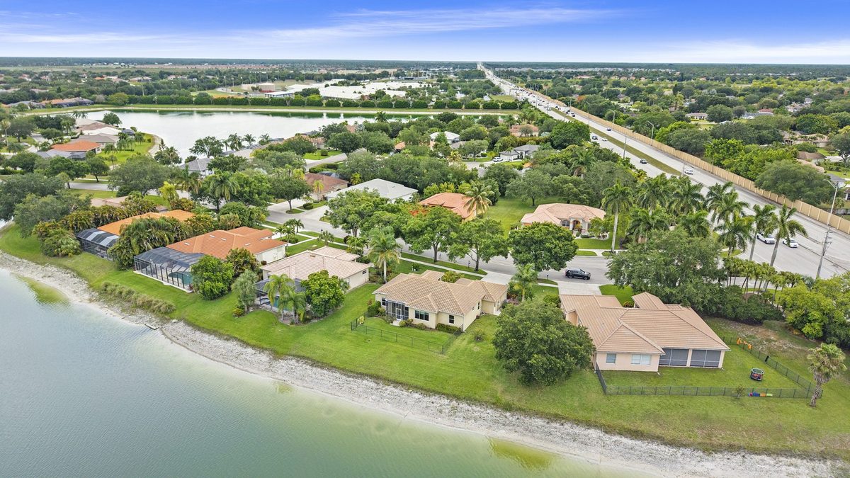 Aerial view of lakefront homes in the Waterways of Naples community in Naples, Florida