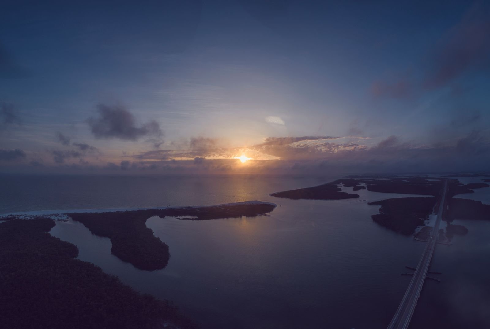Aerial of a waterway at sunset in Bonita Springs, Florida