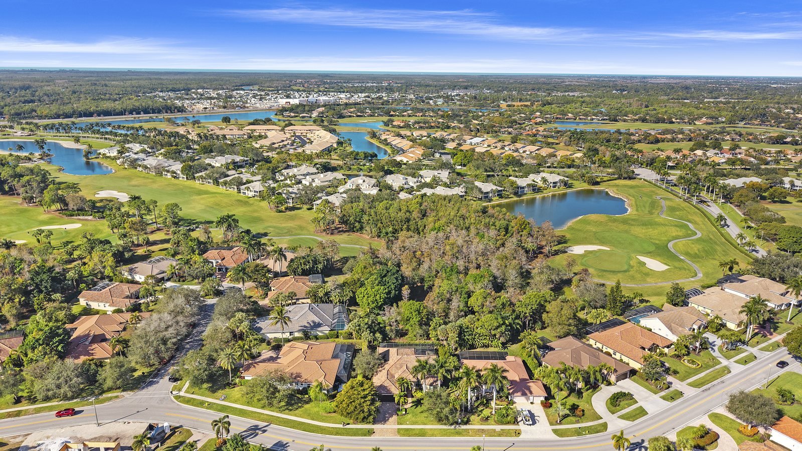 Aerial of the Lely Resort golf course, lakes and homes in South Naples, Florida